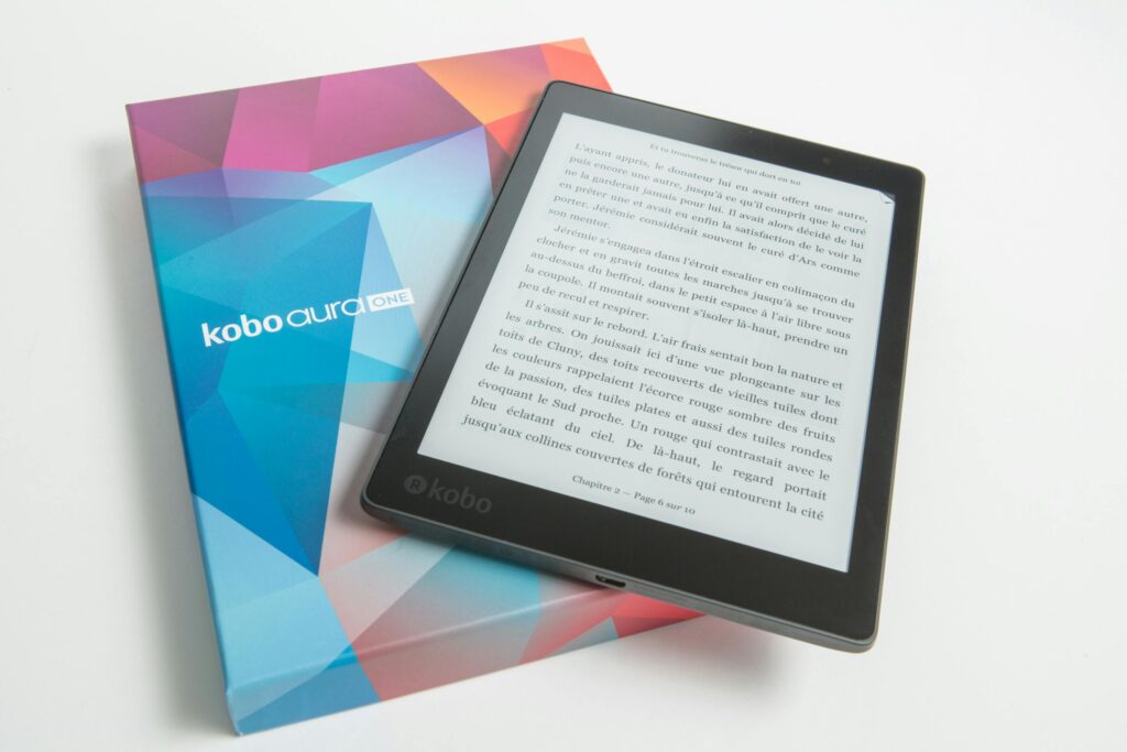 E-reader displayed on colorful packaging, showcasing ebook technology.