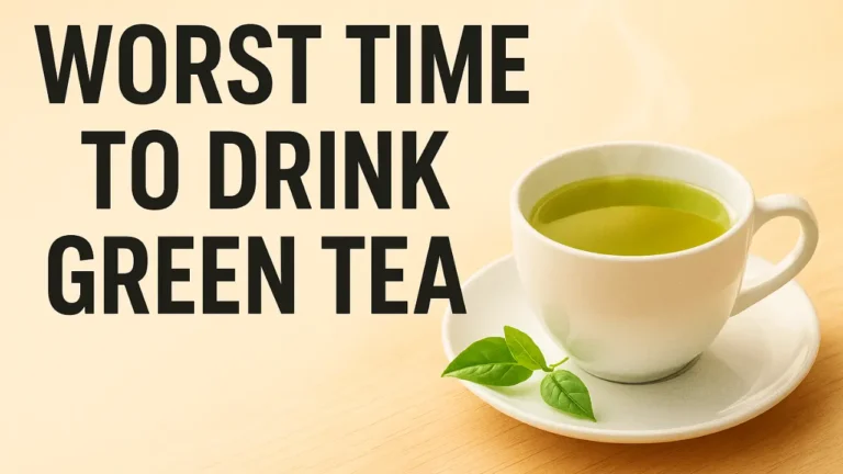 Clock with red danger zone next to a steaming cup of green tea, visually representing the worst time to drink green tea.